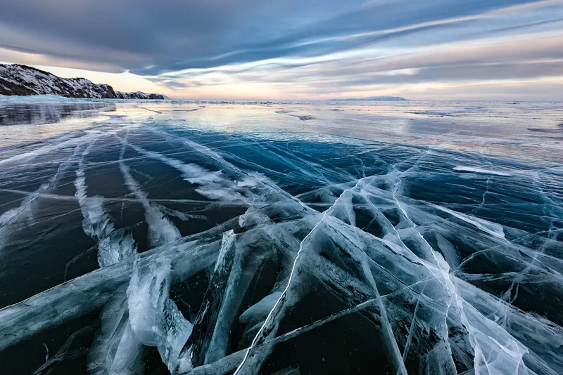 Clear black ice on Lake Baikal near Olkhon island, January 2016