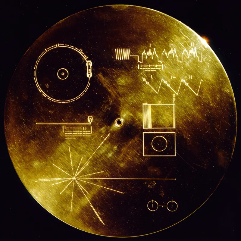 The gold-colored cover of the Voyager Golden Record, with its instructions for playing the record