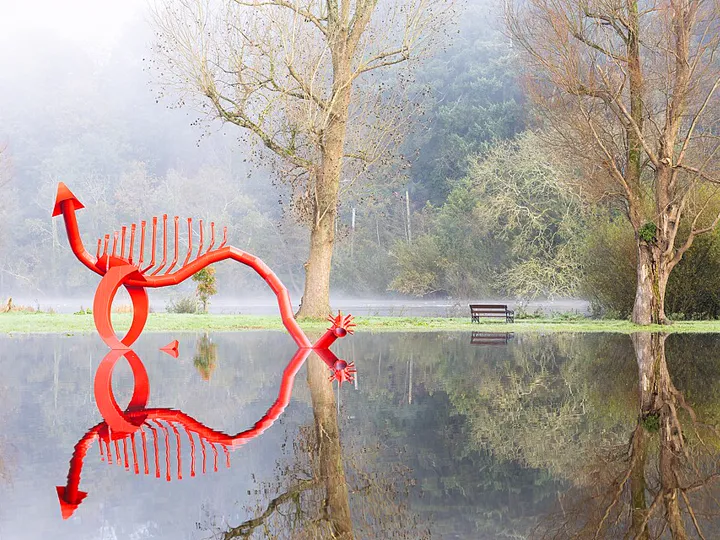 Jim Buckley’s Red Dragon sculpture from 1985 during River Lee flooding, October 2023